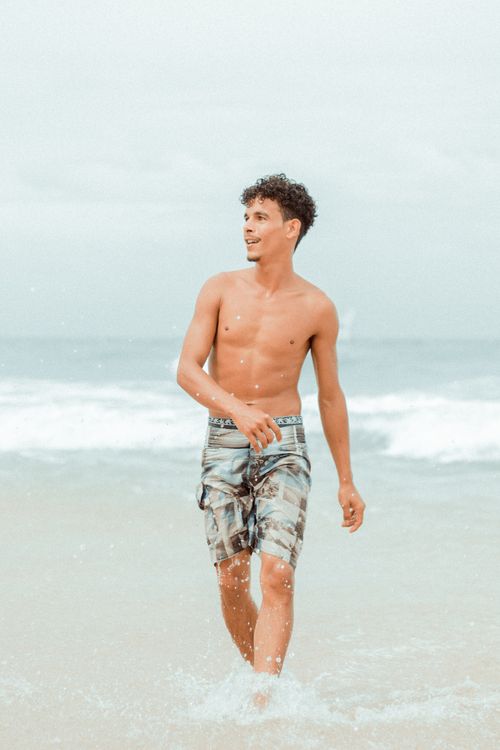 Free Young man enjoying a day on Canoa Quebrada beach, Ceara, Brazil. Stock Photo