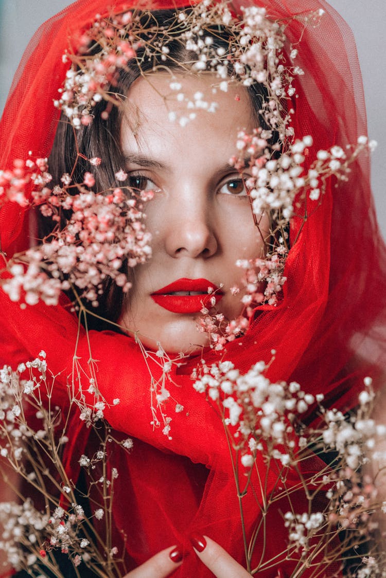 Woman With Red Veil And Flowers