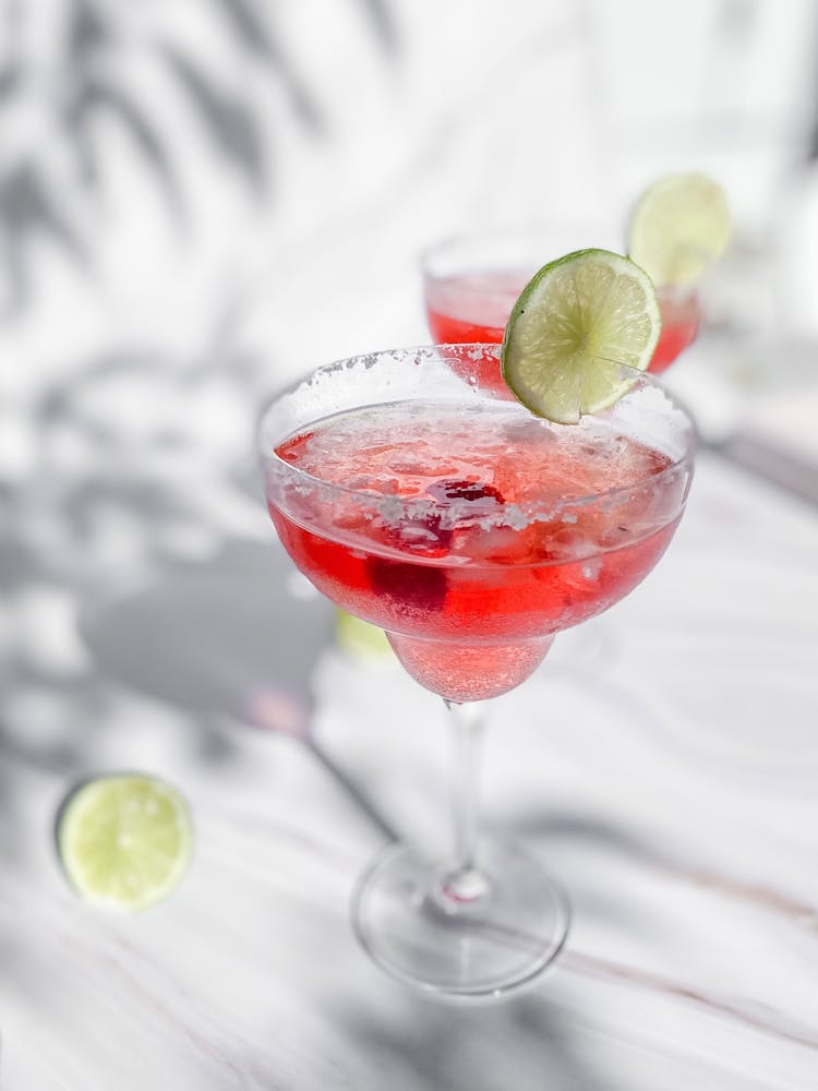 Red Cocktail With Lime