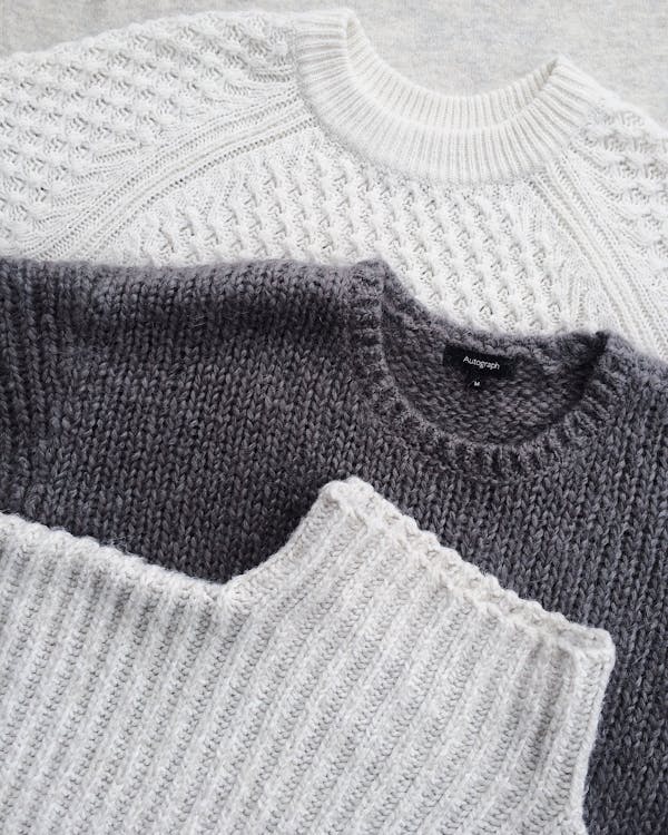 Close-up Photo of Three Sweatshirts