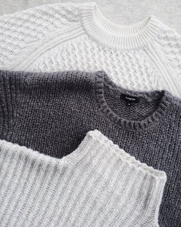Free Close-up Photo of Three Sweatshirts Stock Photo