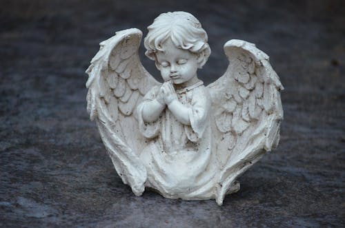 Free Close-Up Photo of a White Angel Figurine Stock Photo