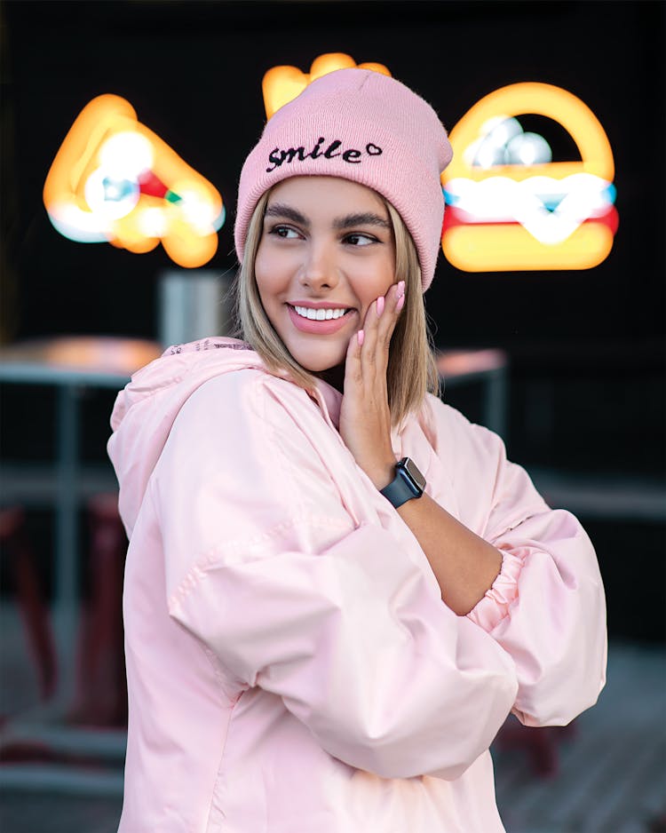 Woman In Pink Cap And Jacket