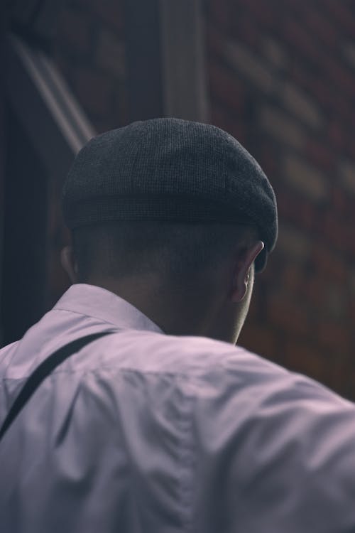 Back View of a Man with a Flat Cap