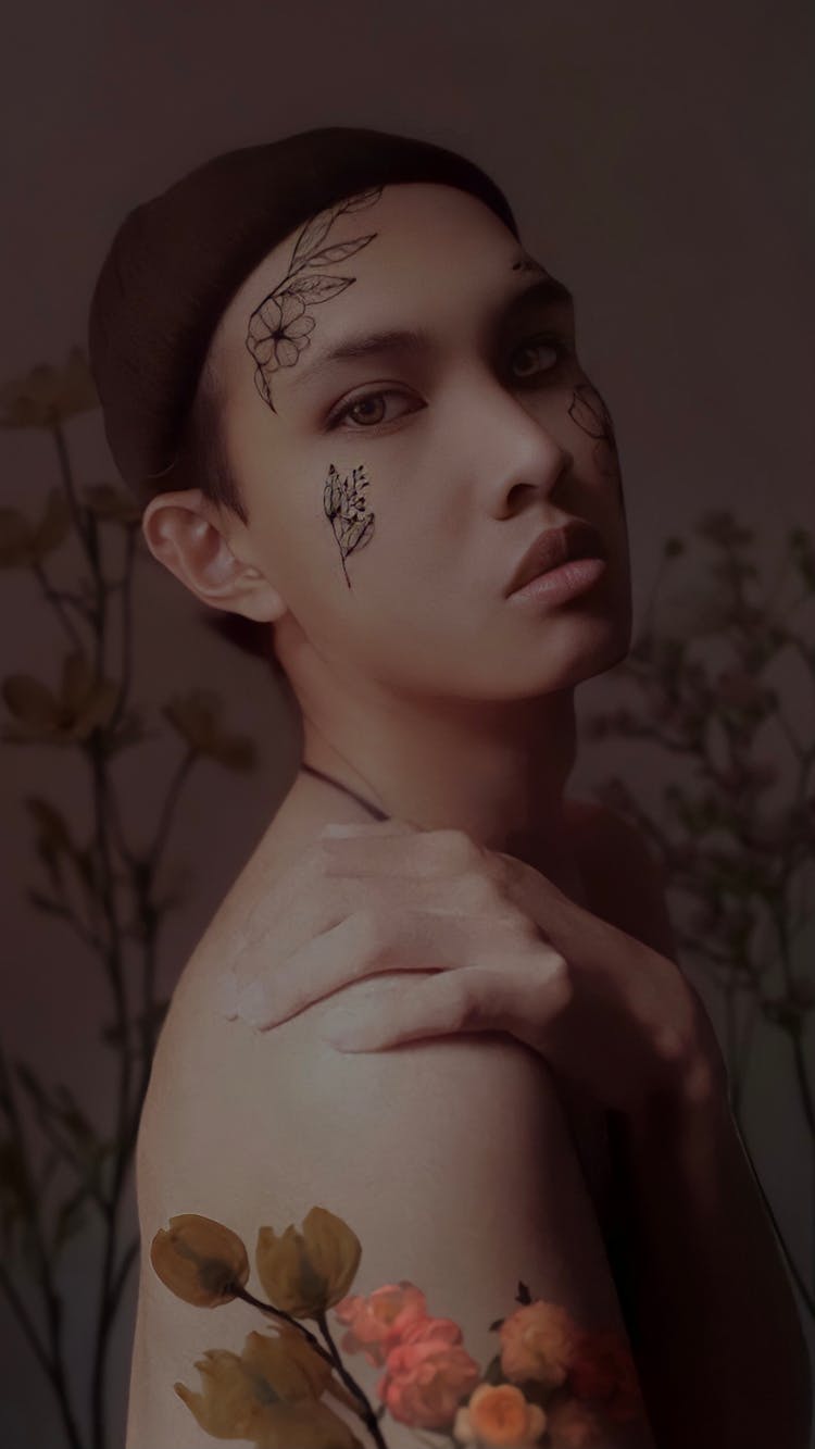 Shirtless Young Man In Hairnet With Painted Face