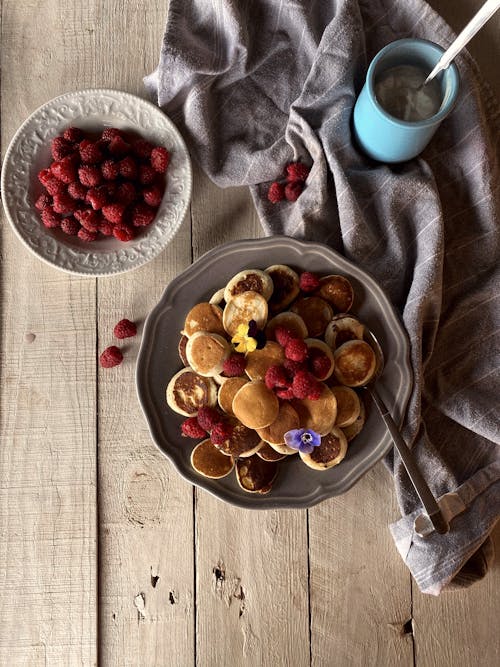 Free Overhead Shot of Pancakes with Raspberries Stock Photo