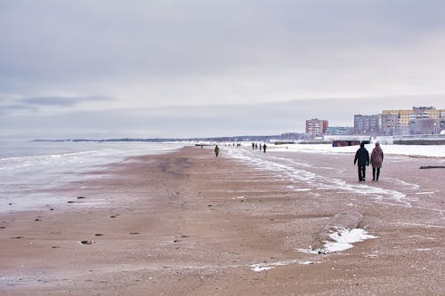 People Walking on the Beach