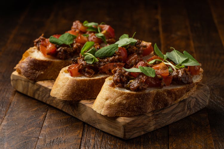 Meat, Tomatoes And Basil On Bread