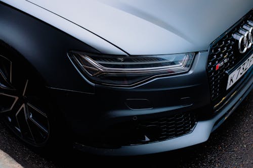 Silver Audi Car on Gray Asphalt Road