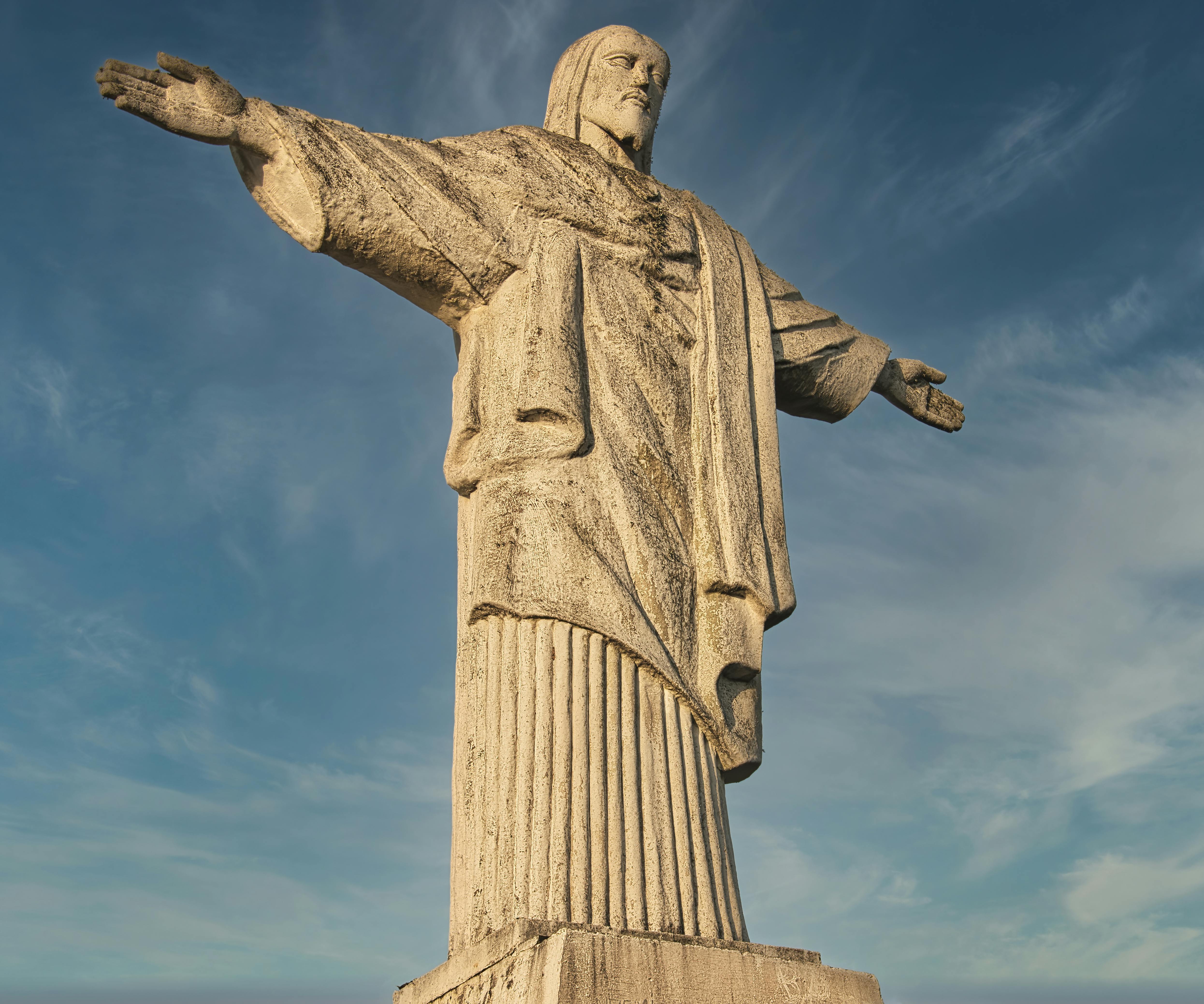 a concrete statue of jesus