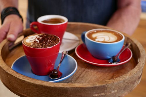 Hot Drinks in Mugs on Saucers