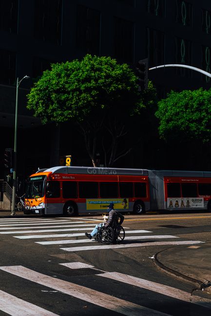 wheelchair user boarding public bus