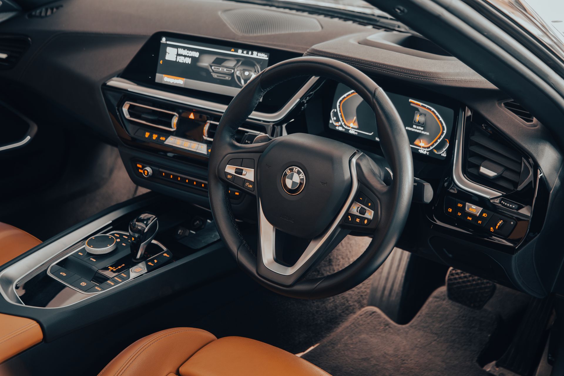 Explore the sophisticated interior of a modern car featuring an advanced dashboard and sleek design.