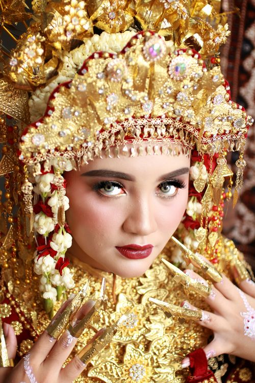 Portrait of a Woman with a Gold Headdress · Free Stock Photo