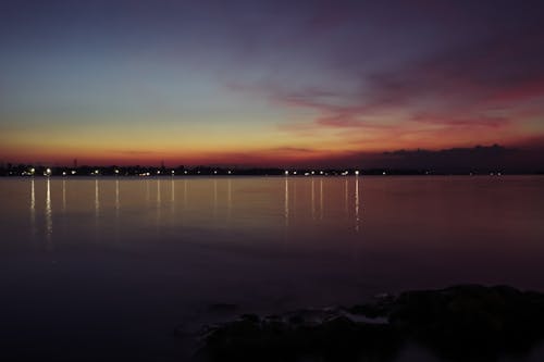 Бесплатное стоковое фото с вид на залив, золотой горизонт, красивое небо