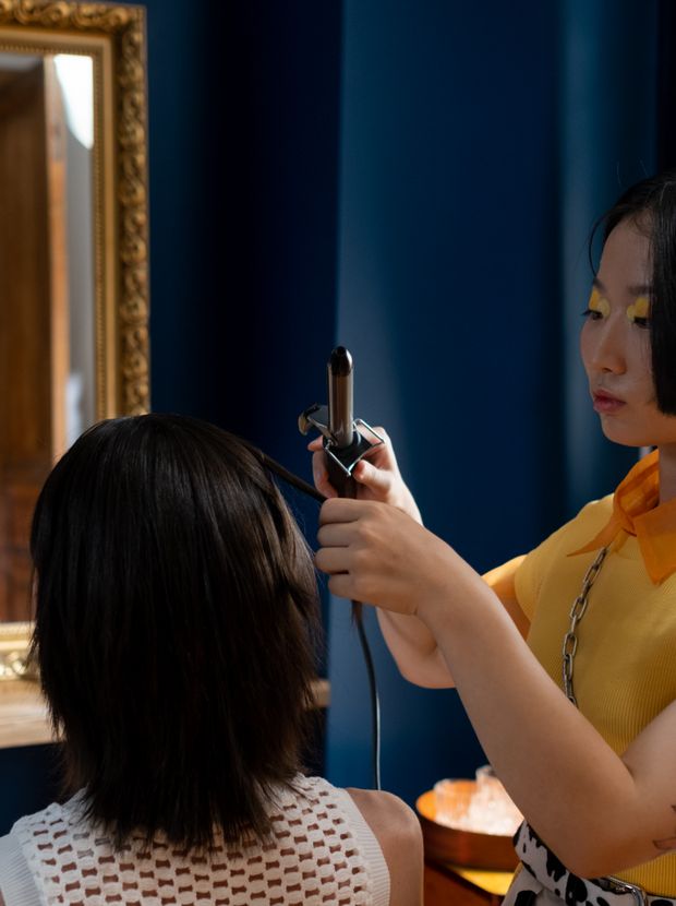 Hair being curled and set