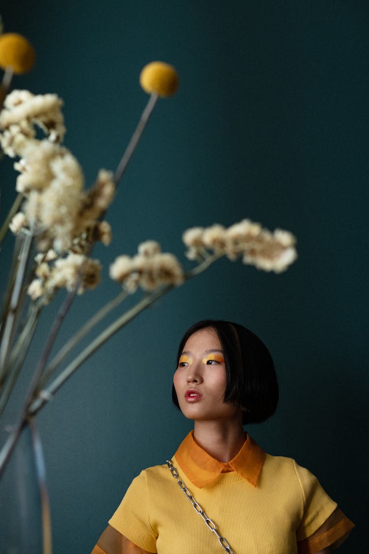 Woman Looking Around And Flowers