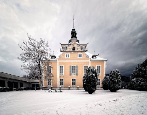 A Villa Toscana Congress Gmunden on a Snow Covered Ground
