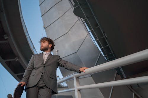 Free Low-Angle Shot of a Man Wearing a Gray Suit Stock Photo