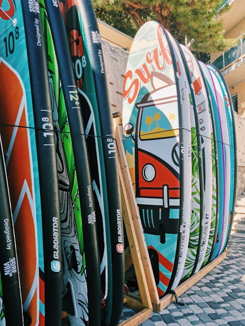 Surfboards with Different Designs on Display