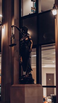 Woman in Black Dress Statue