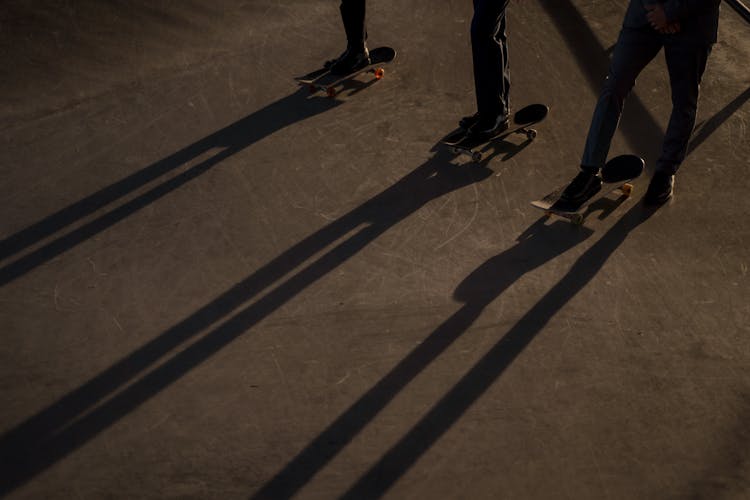 Photo Of Feet On Skateboards