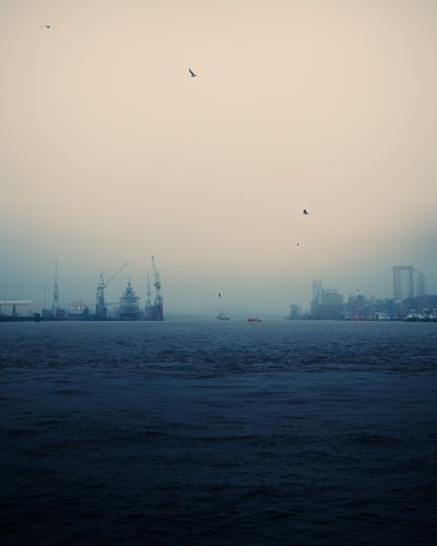 Harbour in sea haze, photo by Tom Wielspuetz on Pexels