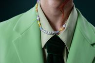 Androgynous Man with Outsider Necklace