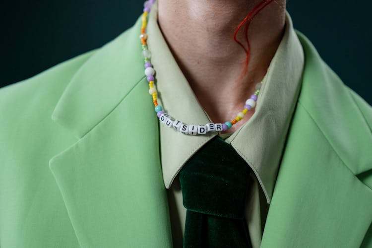 Androgynous Man With Outsider Necklace