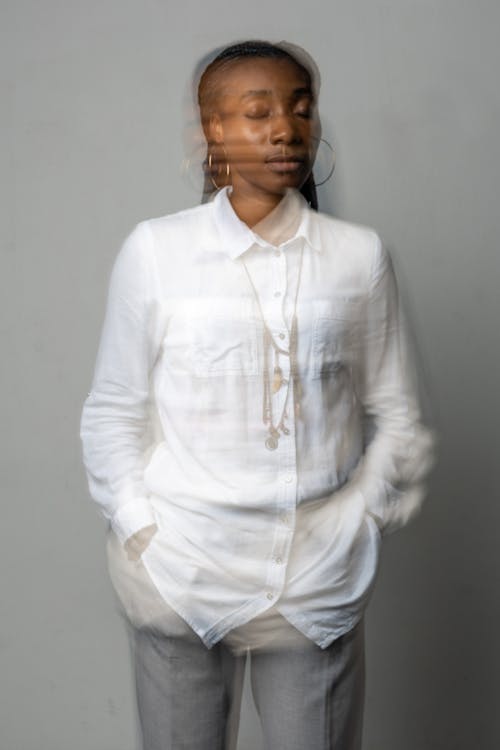Blurred Portrait of a Woman Wearing a White Blouse 