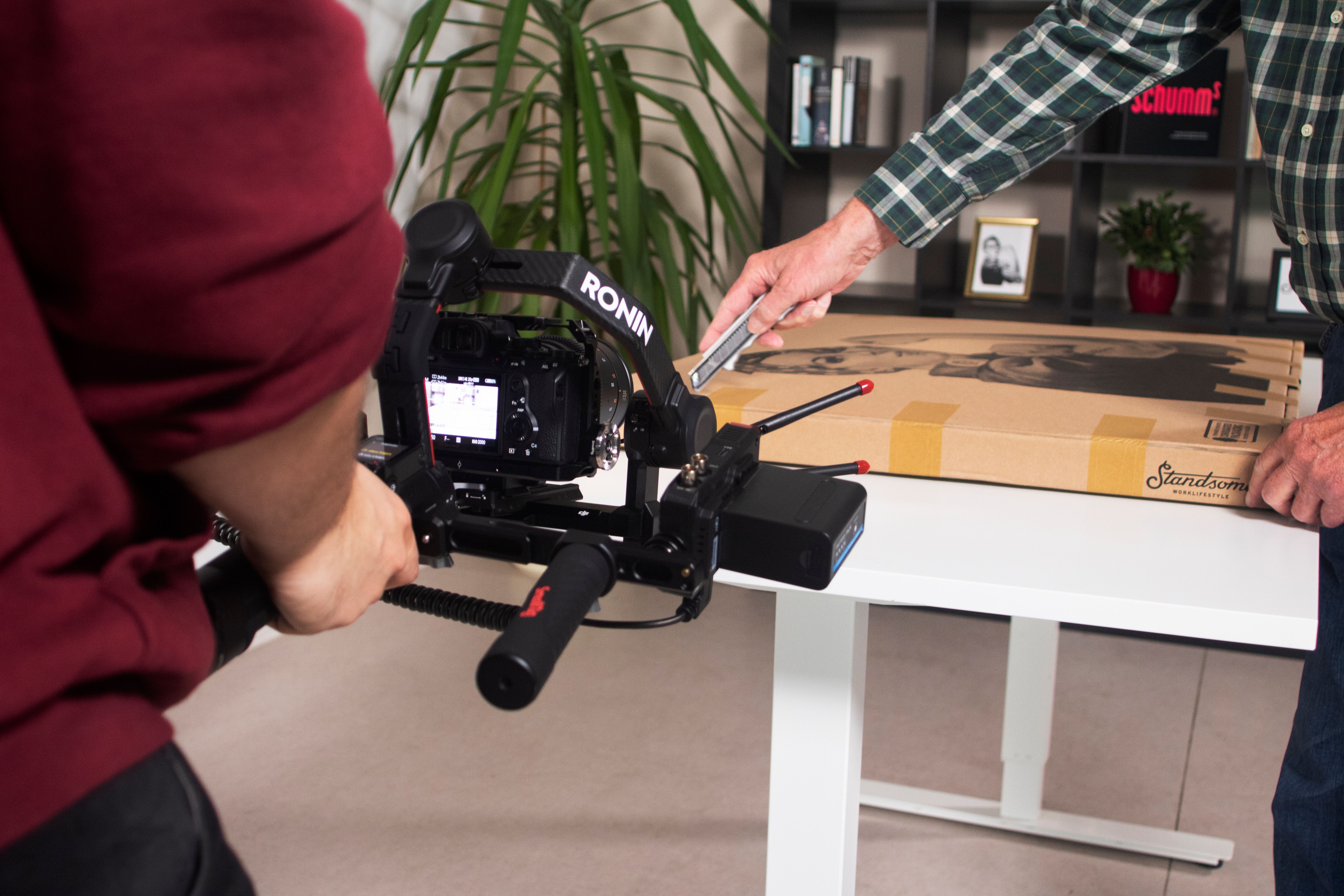 a creator filming a tiktok unboxing video - types of ugc content