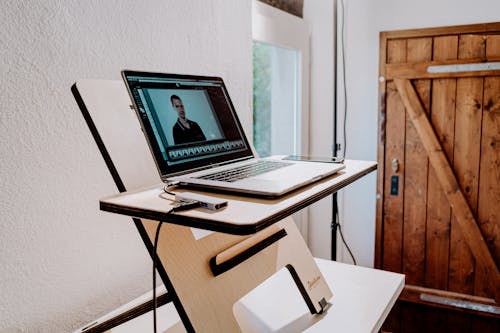 Black and Silver Laptop Computer on White Table