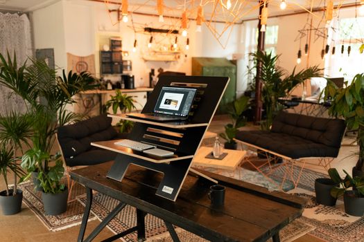Macbook Pro on Brown Wooden Table