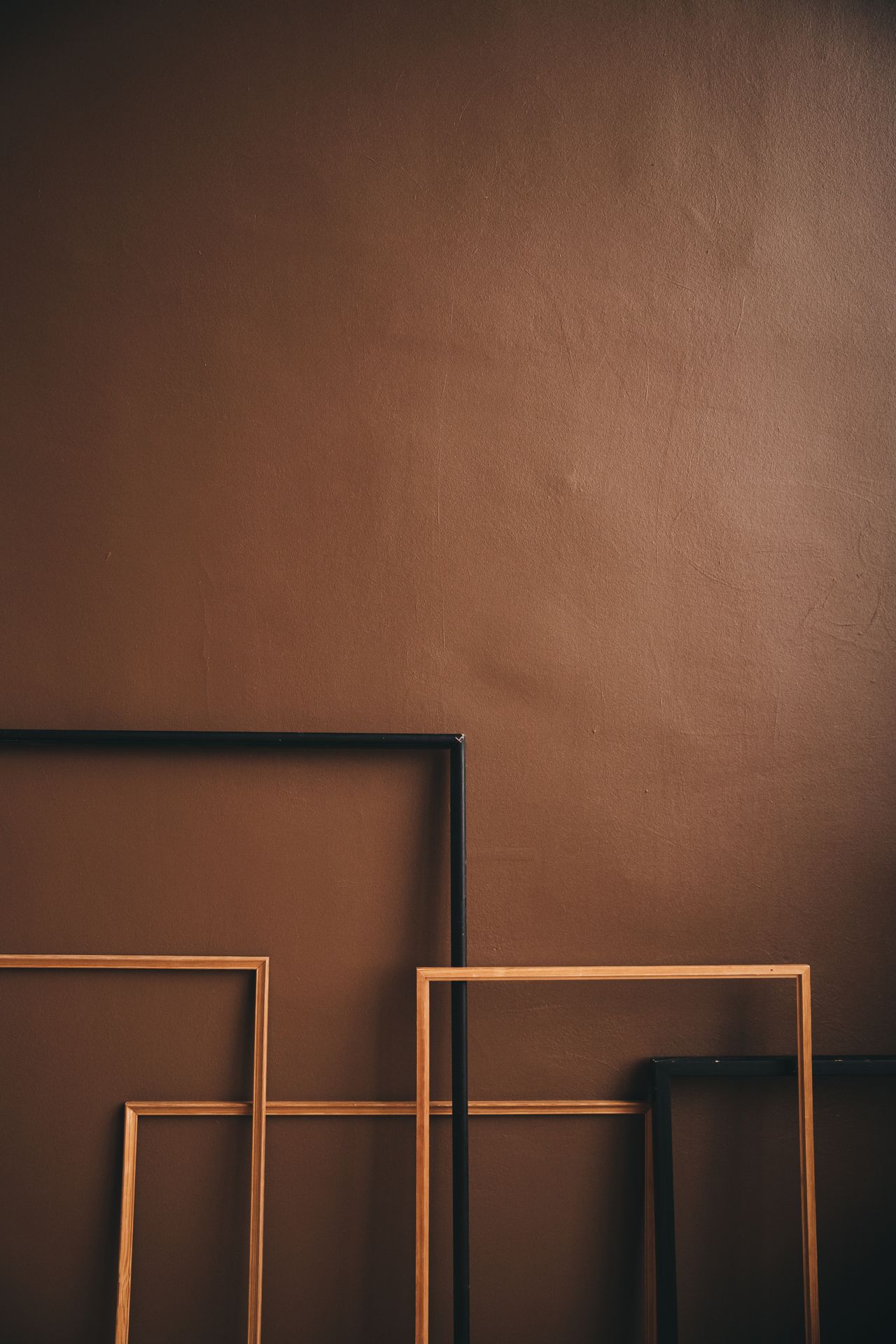 neutral-wall-art-frames Neutral framed wall art in a living room
