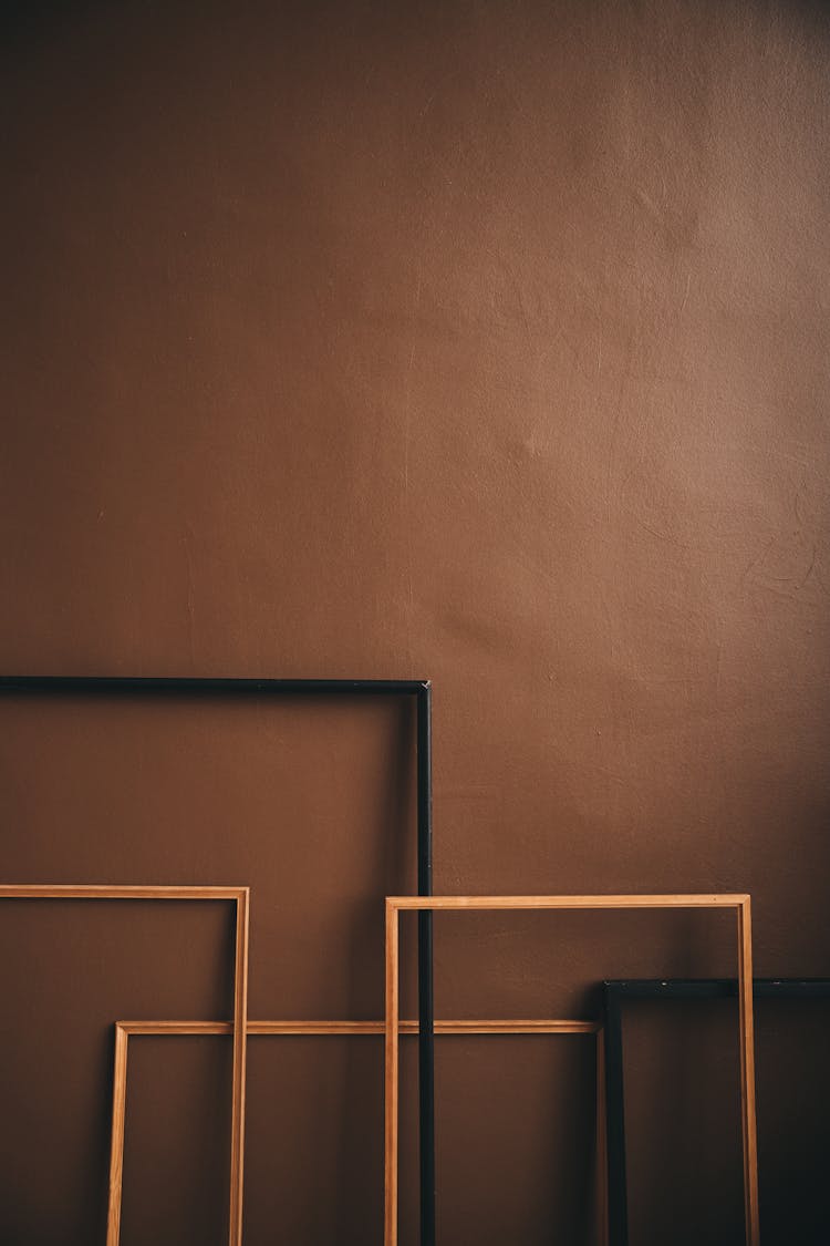 An Empty Frames Leaning On Wall 