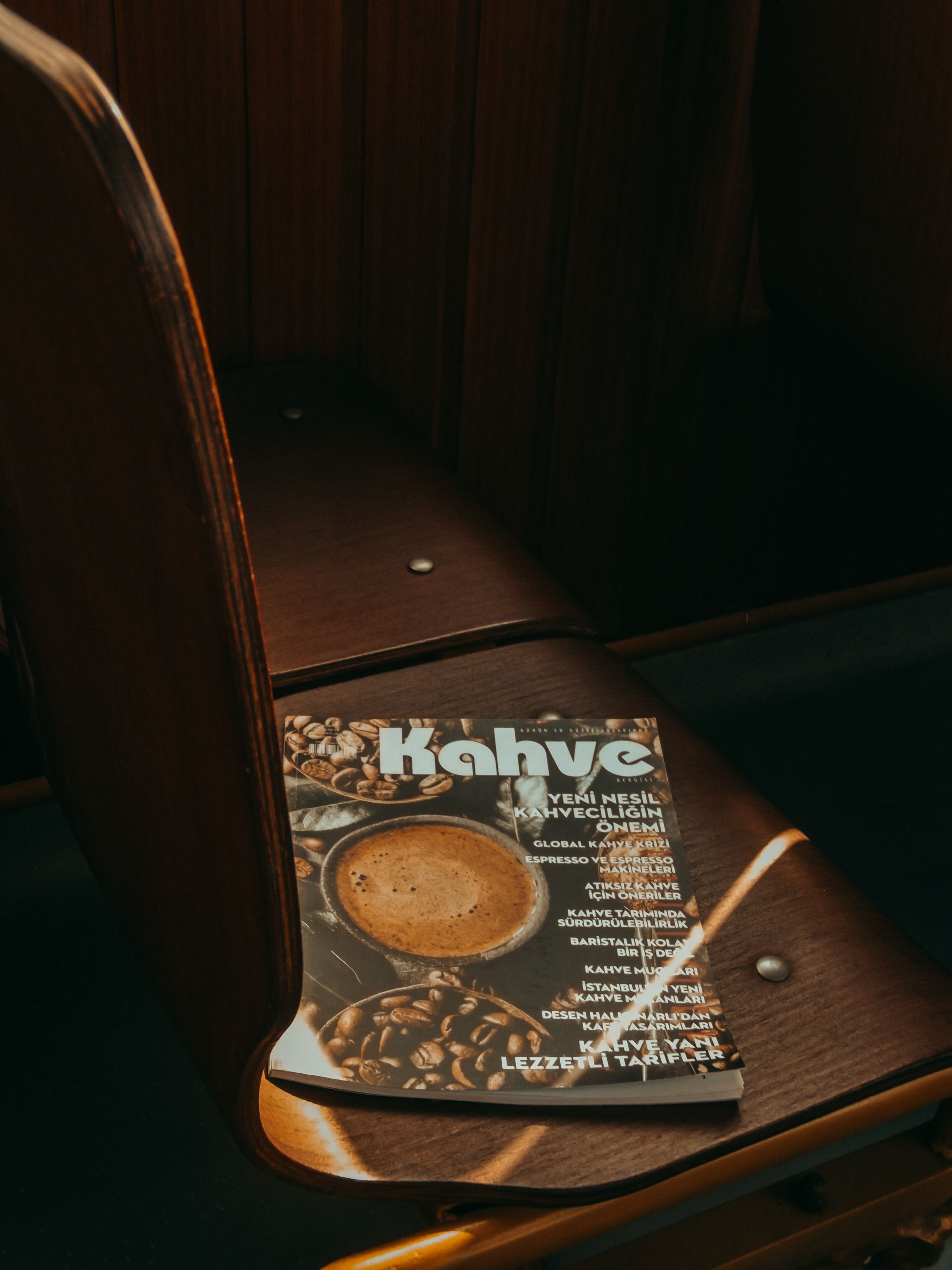 Photo of a Magazine on a Chair · Free Stock Photo