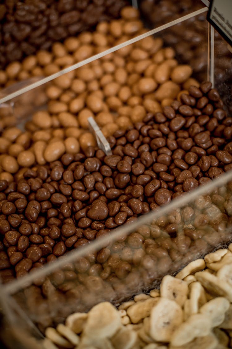 Chocolate Coated Nuts And Fruit In A Store 