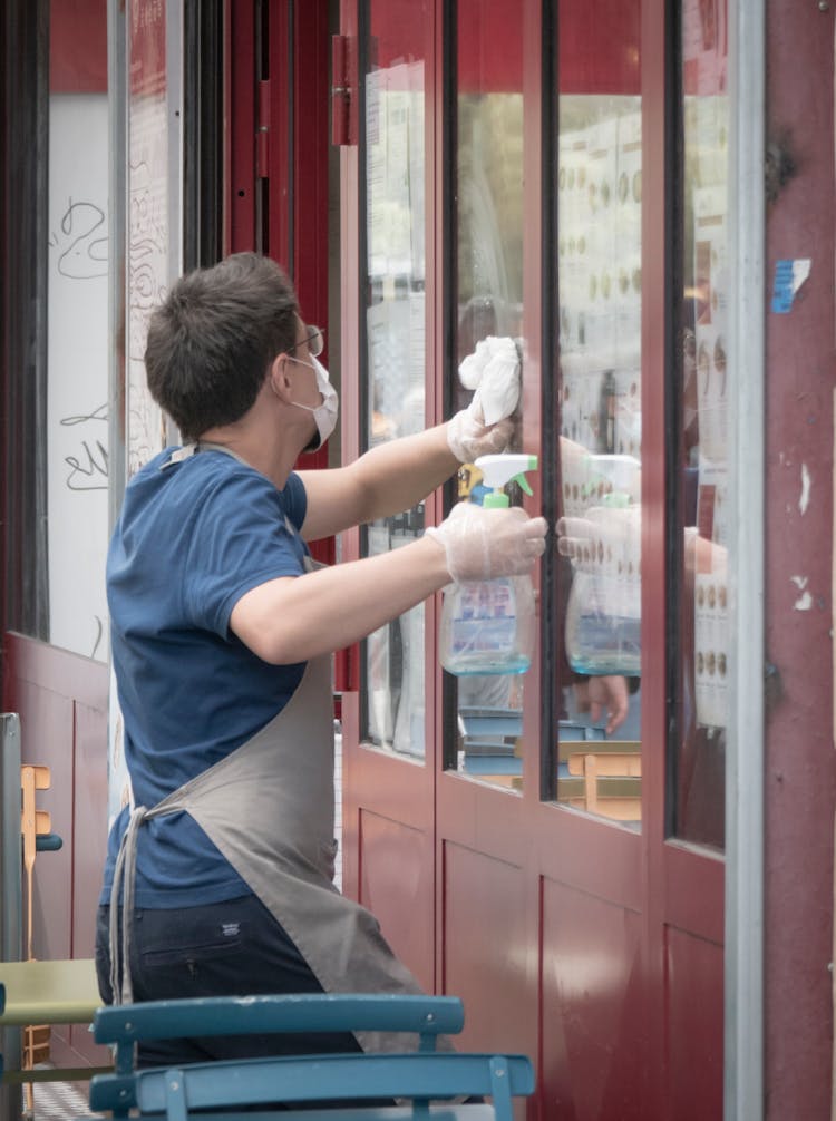 Man Washing Shop Windows 