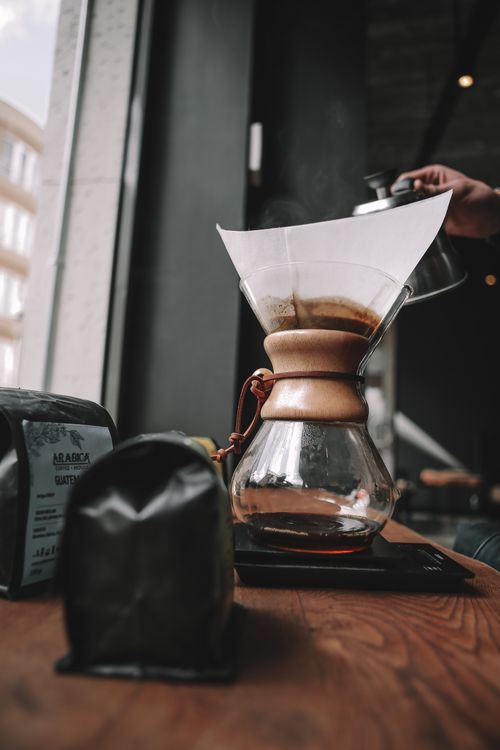 Free Close-up of a Chemex coffee maker brewing fresh coffee in an Eskişehir café, Turkey. Stock Photo