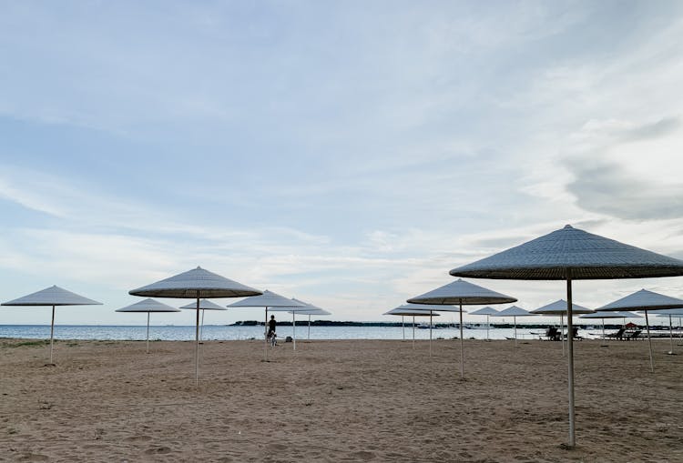 Umbrellas On Resort Beach