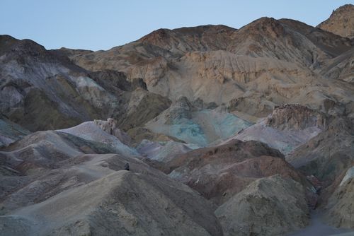 Free A stunning view of a desert landscape with colorful rock formations and eroded geology. Stock Photo