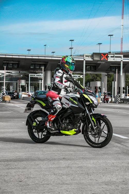 Photo of a Person Riding a Motorcycle