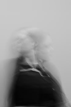 Creative black and white portrait displaying motion blur effect. Perfect for abstract art themes.