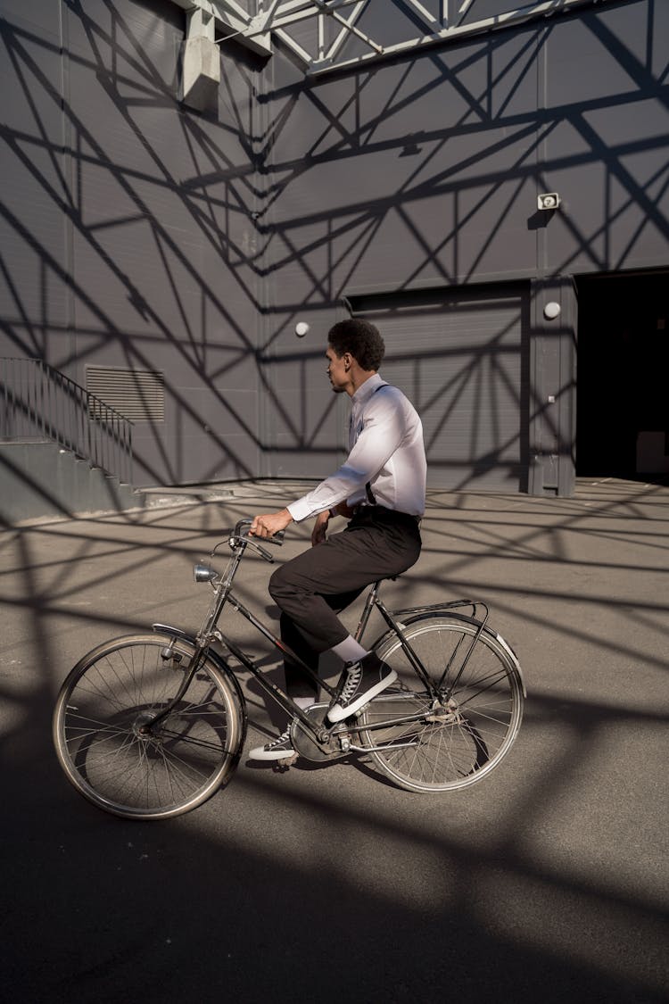 Stylish Man Riding A Bicycle