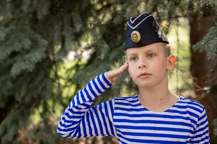 A Boy Wearing Forage Cap