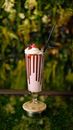White Ice Cream With Strawberry on Top