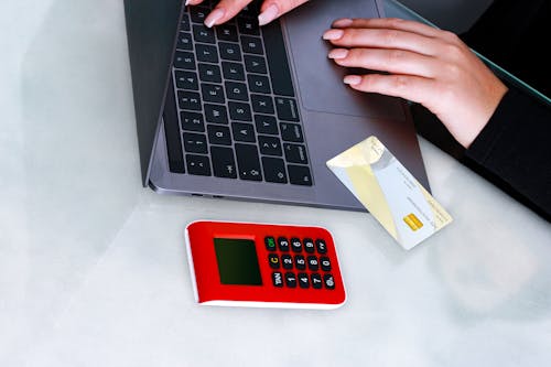 Close-up Shot of Person Typing on Laptop