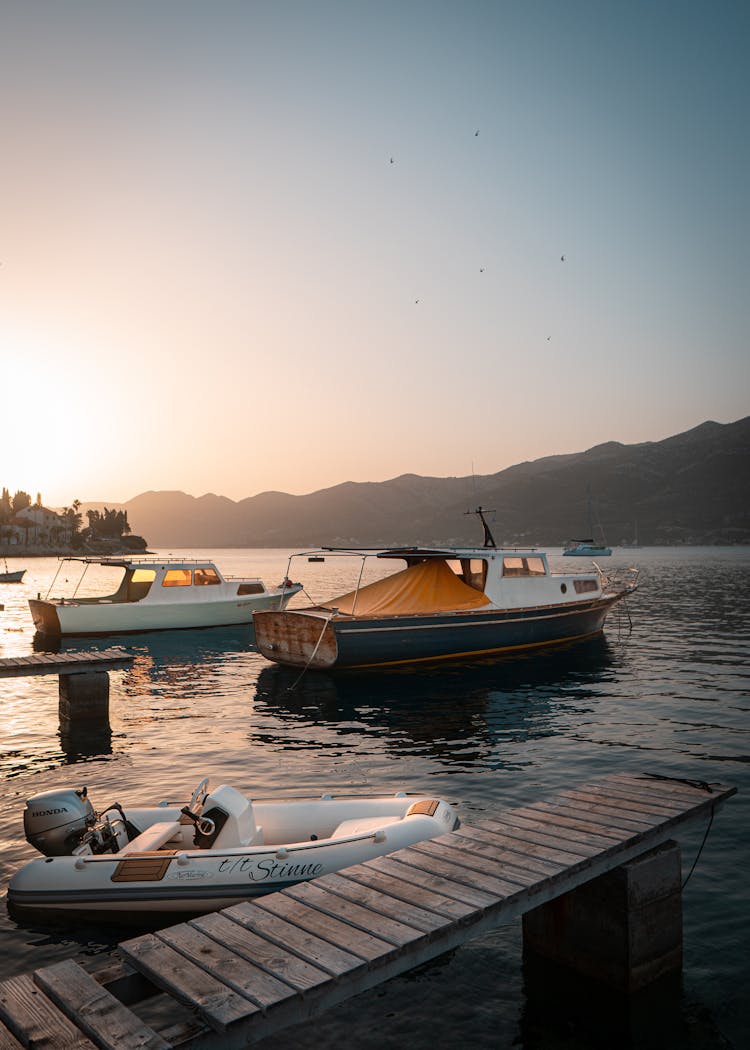 Speedboats Near Wooden Dock