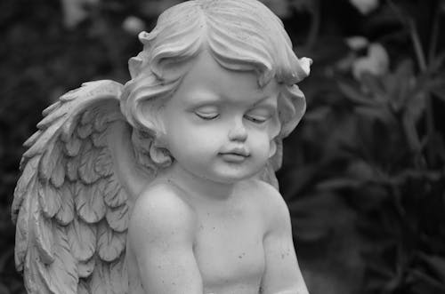 Free Close Up Photo of an Angel Figurine Stock Photo