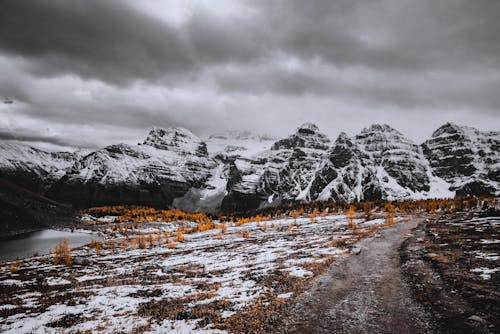 

A Snow Covered Field and Mountains